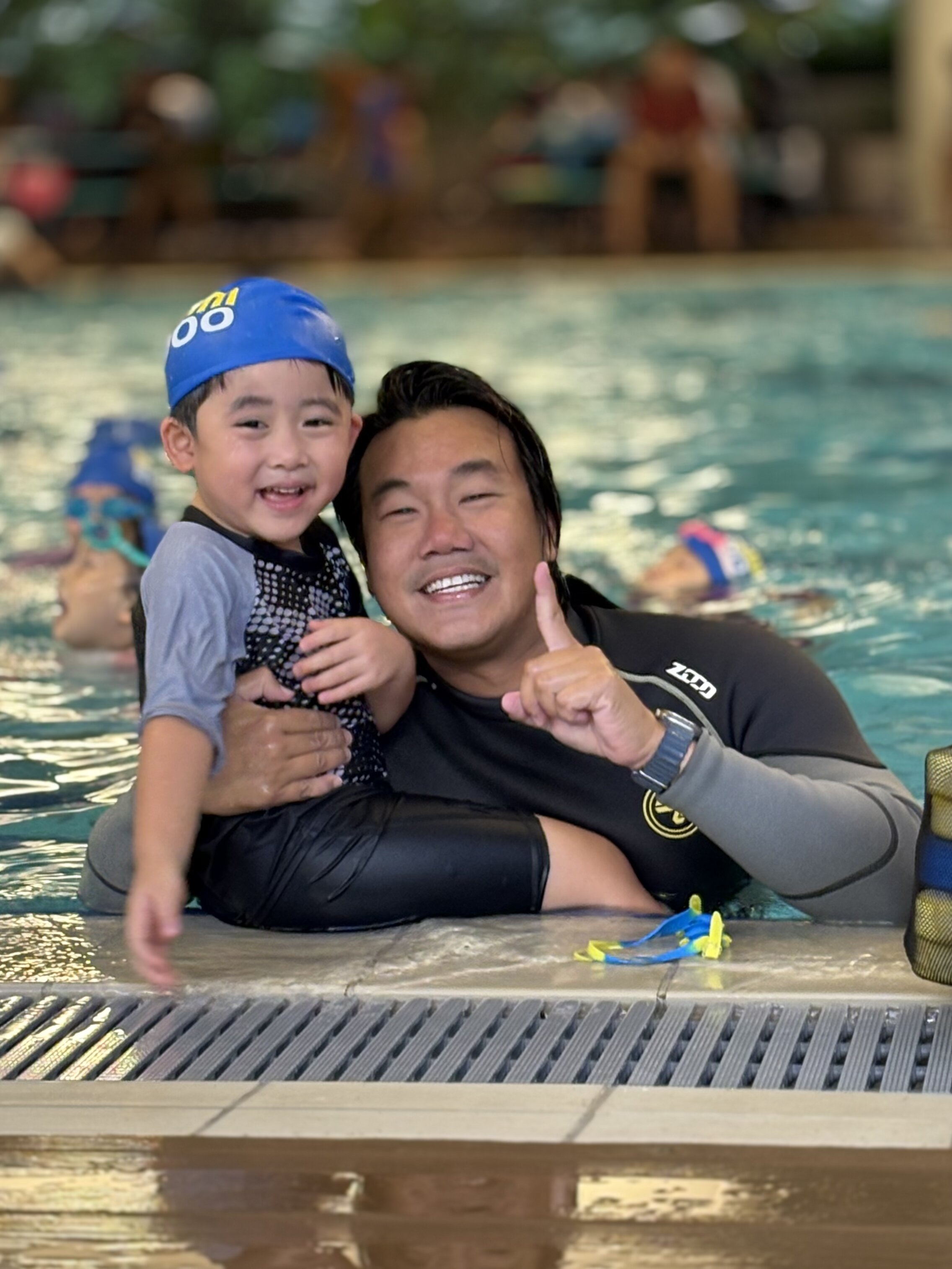 Beginner child learning to swim with confidence